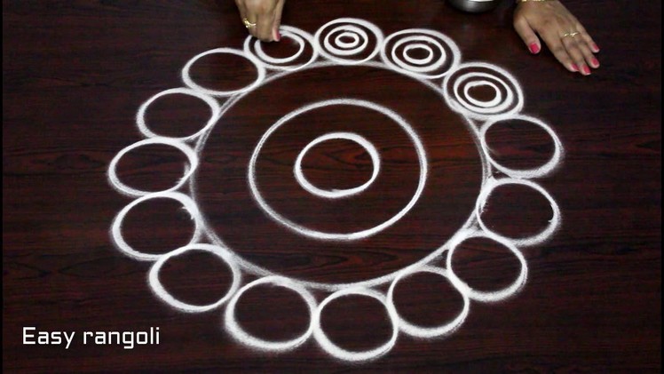 Latest rangoli designs with out dots - creative kolam designs - muggulu designs without dots