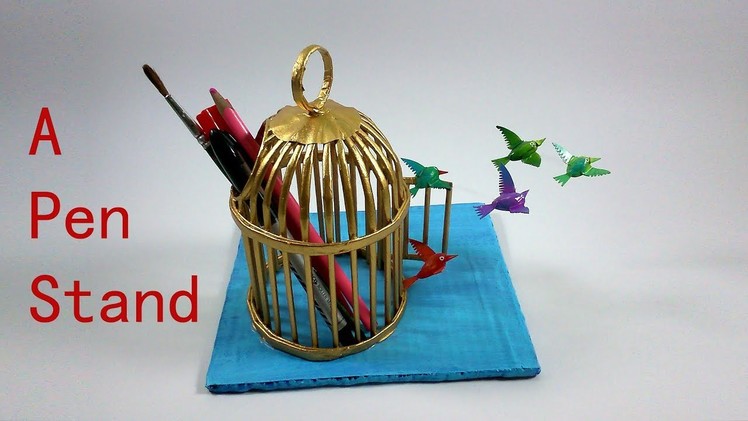 A newspaper cage as pen-stand based on freedom theme.