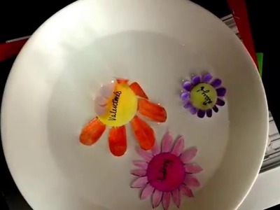 Blooming paper flowers in water