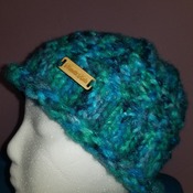 Funky chunky hat for an older child made of a blend of acrylic and nylon.