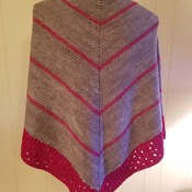 Knit shawl in two-tone gray and dark pink, lacy and striking stripes, 100 percent light worsted merino wool with merino and silk pink edge