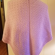 Very warm Aran weight 100 percent merino wool shawl with removable broach closure.