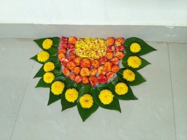 Puja decoration for navratri festival with flowers and betel leaves