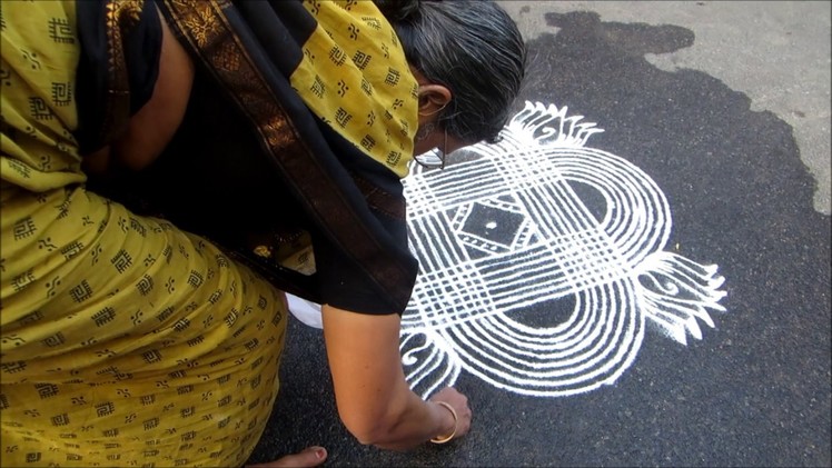 A personal touch to the Mylapore KOLAM contest.     by Chantal Jumel