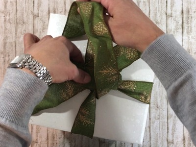 Gift wrapping for clothes and how to tie a bow with one-sided ribbon