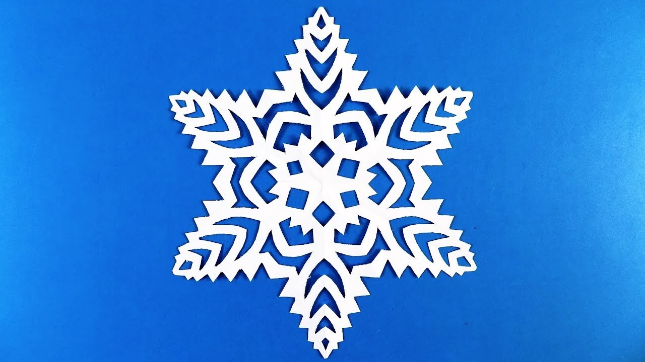 How to make a snowflake out of paper. Make snowflakes out of paper