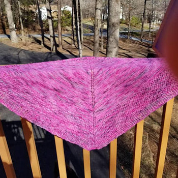 Knitted shawl in beautiful tones of pinks and purples using a blend of 50 percent baby alpaca and 50 percent merino wool. Gorgeous