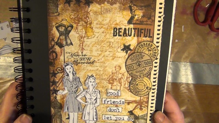 An affirmation album made with the collage stamping techique - new prima doll and tim holtz stamps