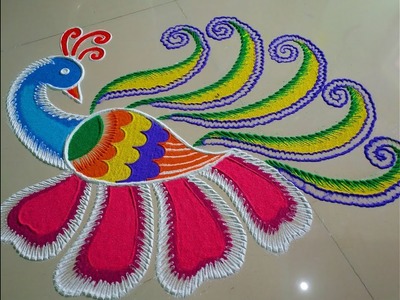 Big and innovative peacock rangoli design.by DEEPIKA PANT
