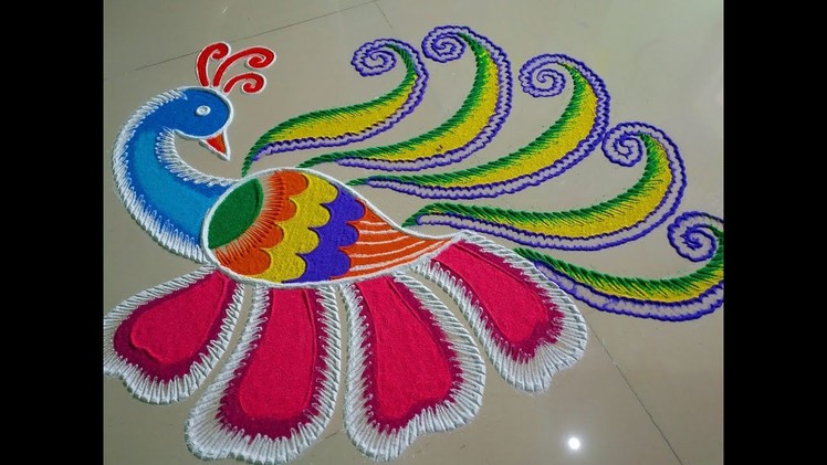 Big and innovative peacock rangoli design.by DEEPIKA PANT