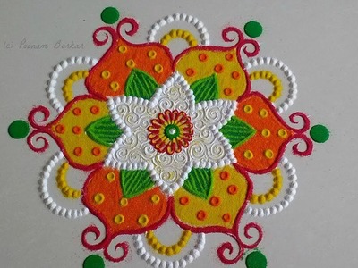 Easy and small rangoli design with 7*4 interlaced dots | Innovative rangoli by Poonam Borkar