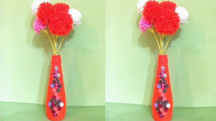 Empty bottle flower vase making with woolen pom pom. Wine bottle decoration Ideas. DIY craft