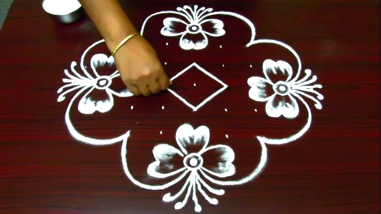Simple and creative rangoli designs || kolam designs with 9 dots || muggulu with dots