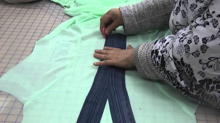 Cutting for insertion of neckline