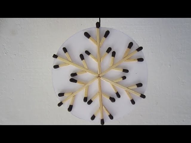Matchstick snowflake christmas decoration craft.