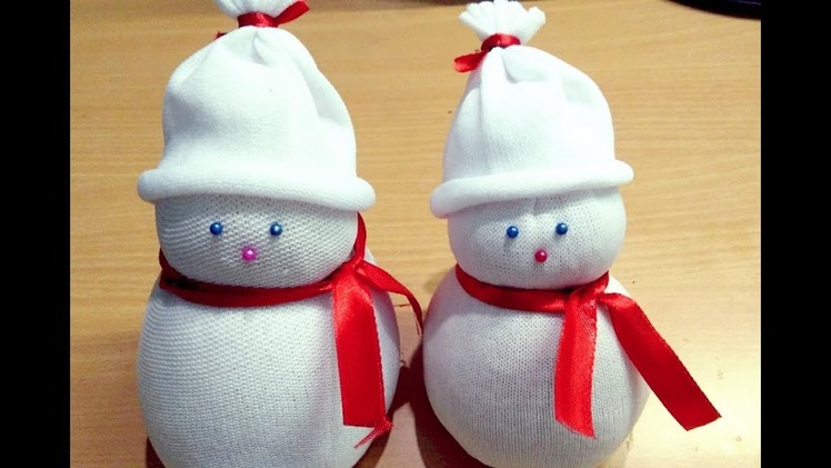 Diy snowman.socks snowman.how to make socks snowman.socks crafts.making of socks snowman