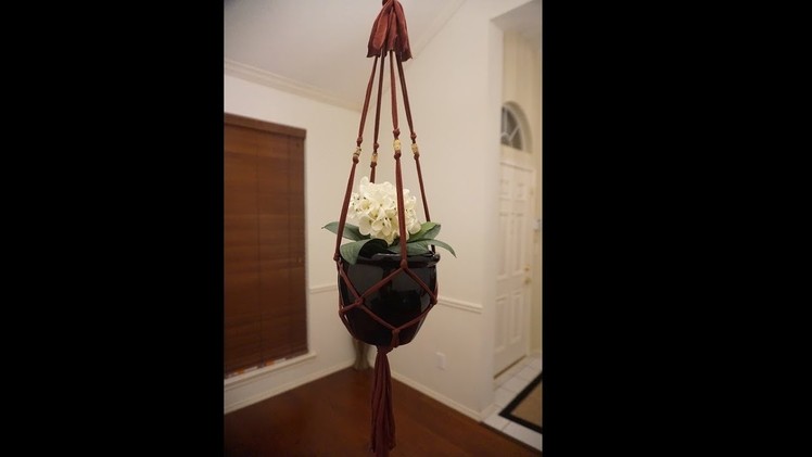 How to make a pot hanger using a legging and paper beads. recycled cloth craft