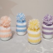 knitted set of 4 spring coloured stripe egg cosies