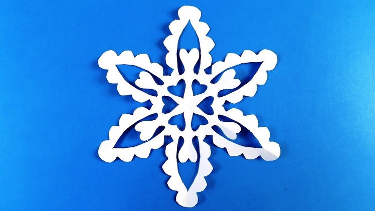How to make a snowflake out of paper. Make snowflakes out of paper