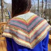 Lovely little hand knit springtime shawlette in mixed colors of merino wool and nylon blend.