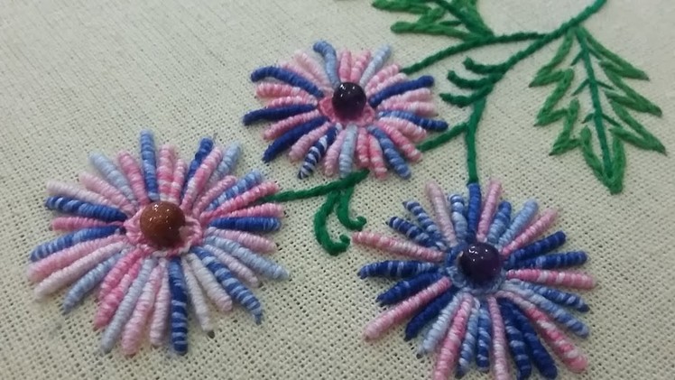 Beautiful hand embroidery of bullion stitch flowers