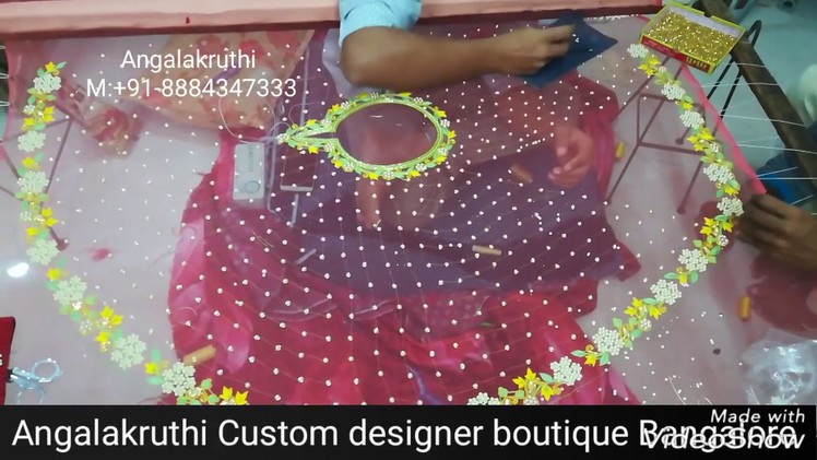 Cape with pearl and Thread hand embroidery designs by Angalakruthi boutique Bangalore
