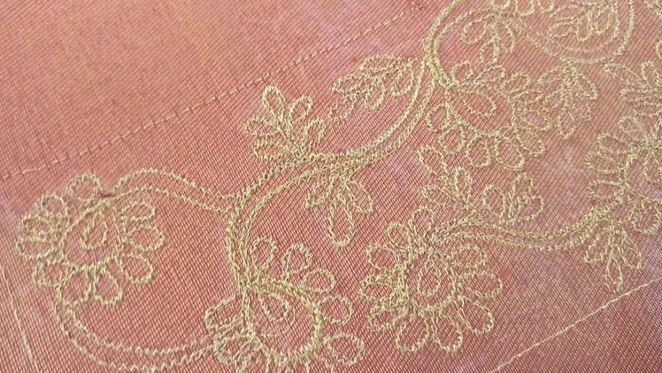 Intricate hand embroidery work on a bridal saree blouse