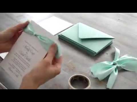 Co-ordinating the printed flat invitation with the ribbons and the lace ribbons