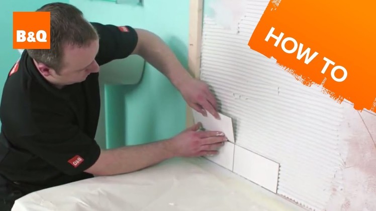 How to tile a bath splashback part 2: fixing the tiles