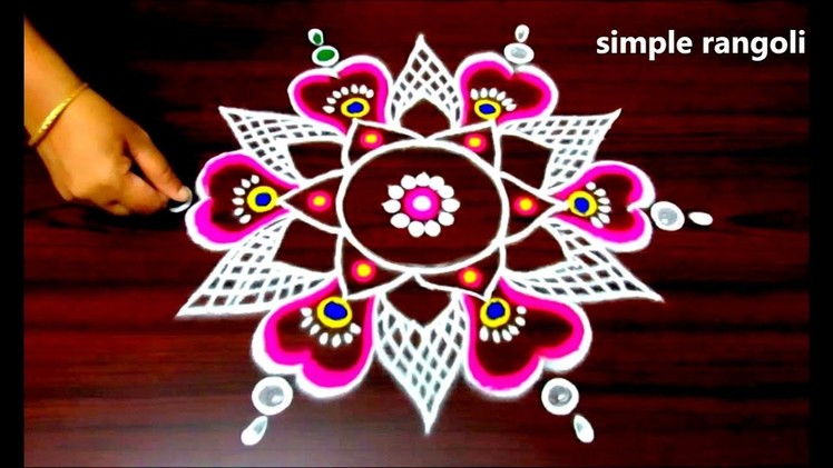 Latest rangoli designs with colours, kolam designs with 7 to 4 dots, small muggulu designs with dots