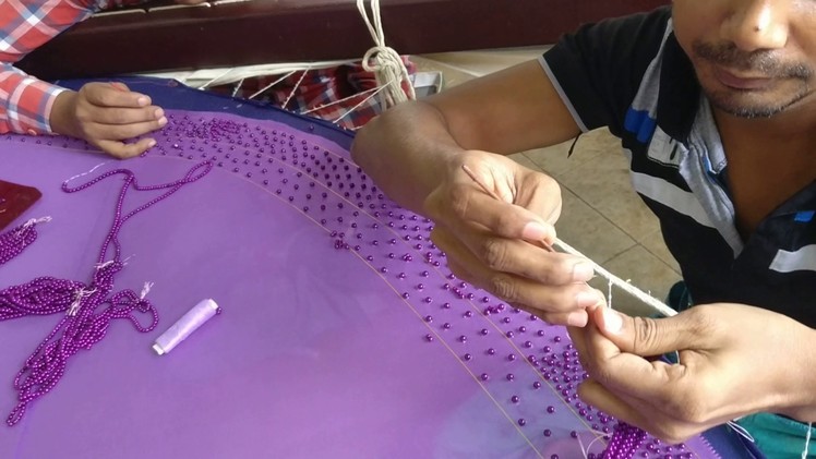 Beautiful violet pearl work lehenga embroidery