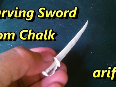 Carving of sword and scabbard from chalk:Micro art by Arif Bookseller