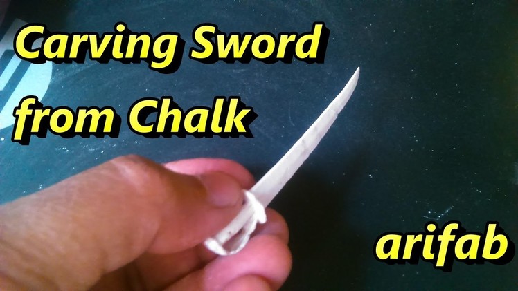 Carving of sword and scabbard from chalk:Micro art by Arif Bookseller