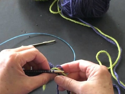 Stranded knitting: adding new color at beginning of round by weaving 1st stitch