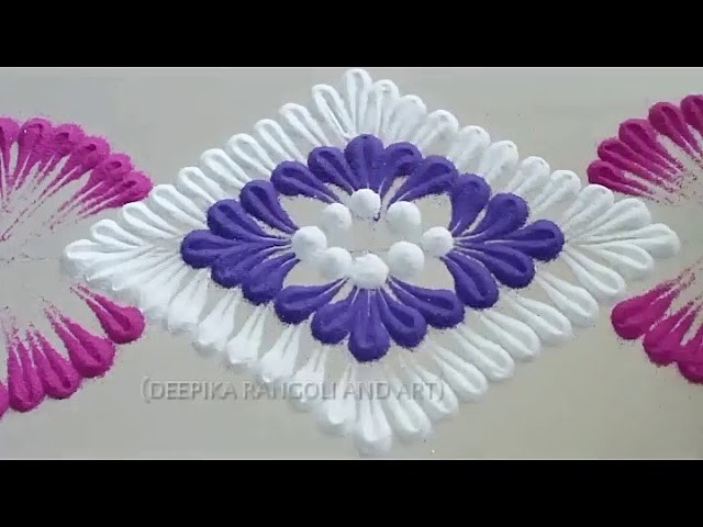 Beautiful and clean colourful rangoli design. by DEEPIKA PANT