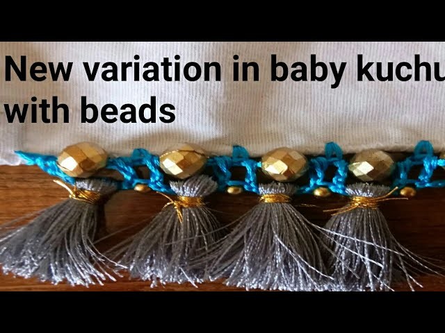 New variation in baby kuchu with beads Saree kuchu.saree tassel. edging  by Nidhi fashions