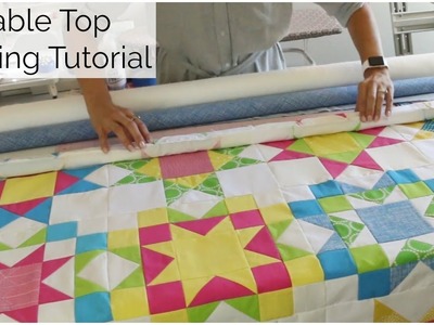 Table Top Roll Basting for Quilting - Excerpt from the Sunny Star Quilt Along!