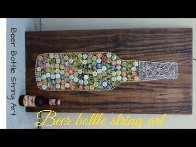 Diy beer bottle string art with beer bottle cap and strings .