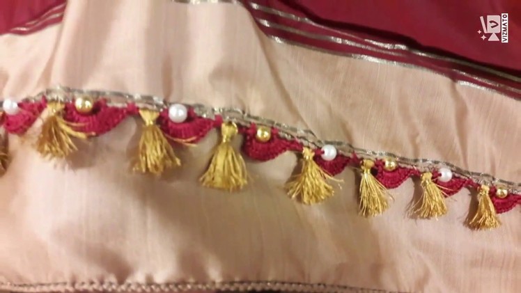 The complete crocheted design of basic seashell shaped saree kuchu design