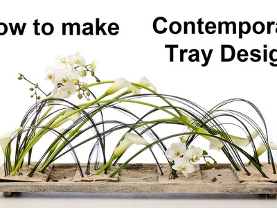 Contemporary tray design - using steelgrass.calla lilies.orchids -