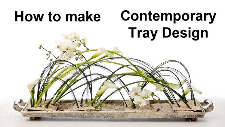 Contemporary tray design - using steelgrass.calla lilies.orchids -