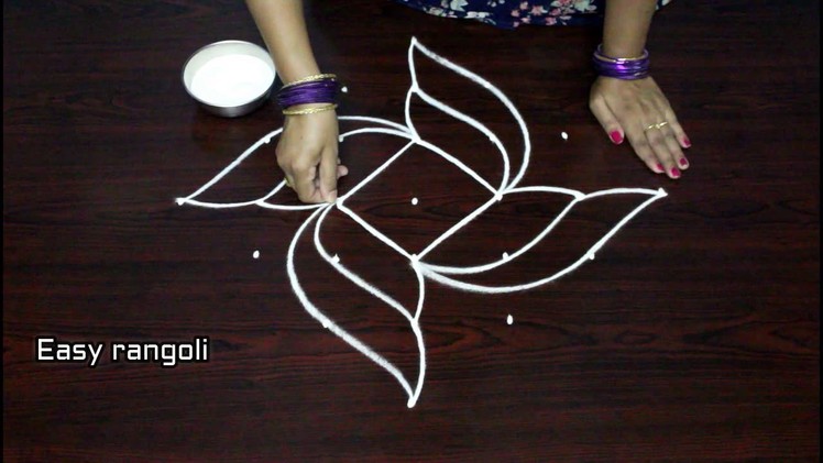 Creative rangoli designs with 7x1 dots , simple kolam designs with dots , muggulu designs