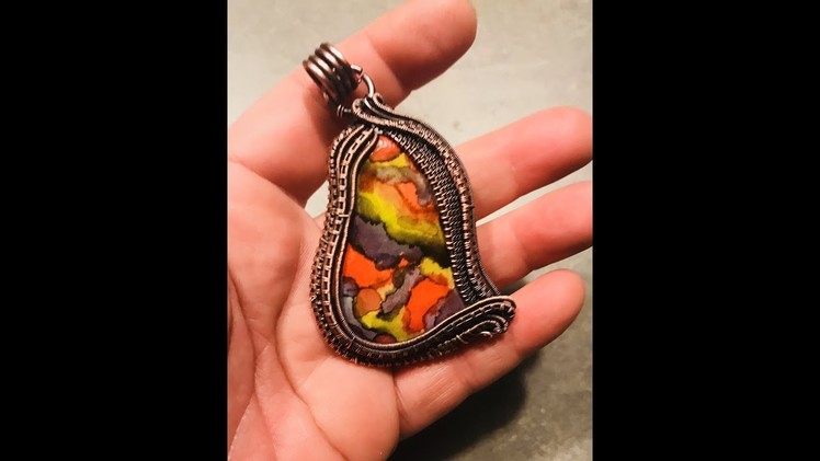 Organic wire wrap using clay cabochon