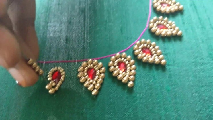 Variety Neck Embroidery Design for a Saree Blouse