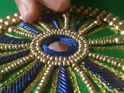 Beautiful Charkra Design Embroidery on a Designer Saree Blouse Sleeve