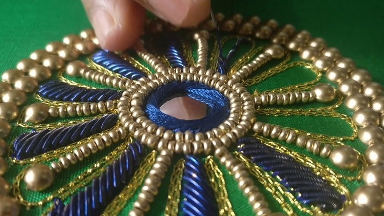 Beautiful Charkra Design Embroidery on a Designer Saree Blouse Sleeve