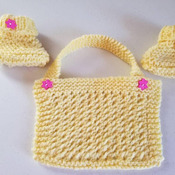 Hand knit Baby booties and bib set in bright yellow