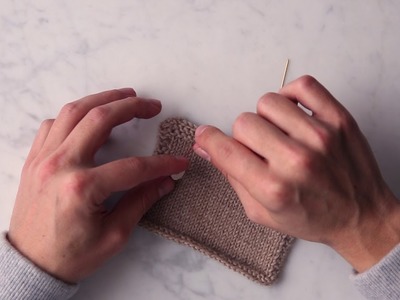 Sewing a Button onto Knitwear Tutorial | Purl Soho
