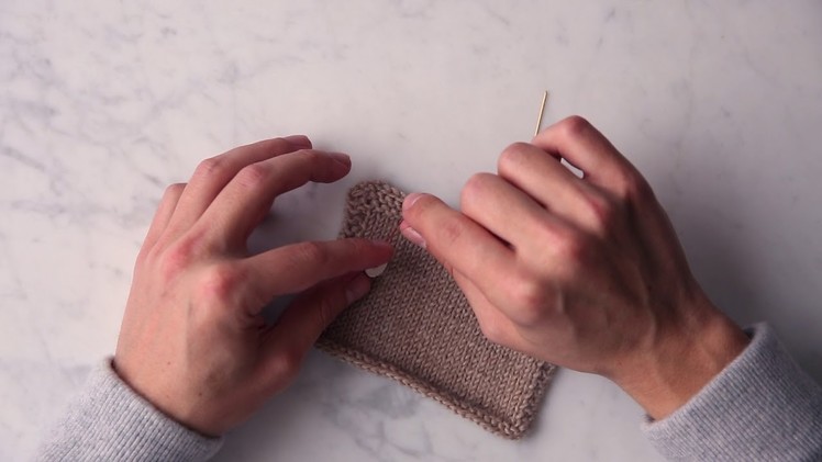 Sewing a Button onto Knitwear Tutorial | Purl Soho