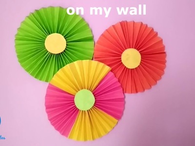 Paper rosettes.Diy crafts.  party , wall decoration. New year decoration. Birthday party decoration